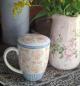 Preview: teetasse-vegan-retro-muster-keramik-hellblau-orange