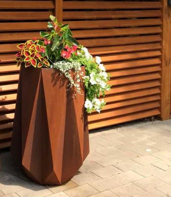 cortenstahl-blumenkuebel-geometrisch-rund-92 cm-hoch
