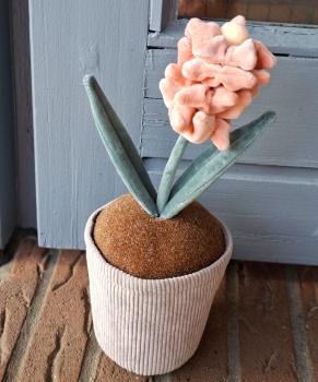 Preview: tuerstopper-blumentopf-mit-rosa-blume-hyazinthe